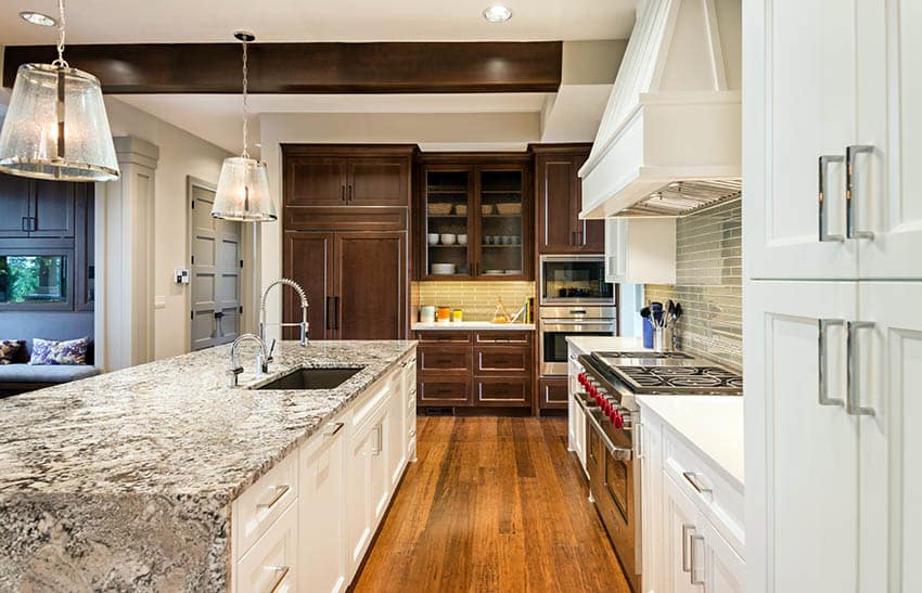 Waterfall kitchen island with white cabinet white countertops