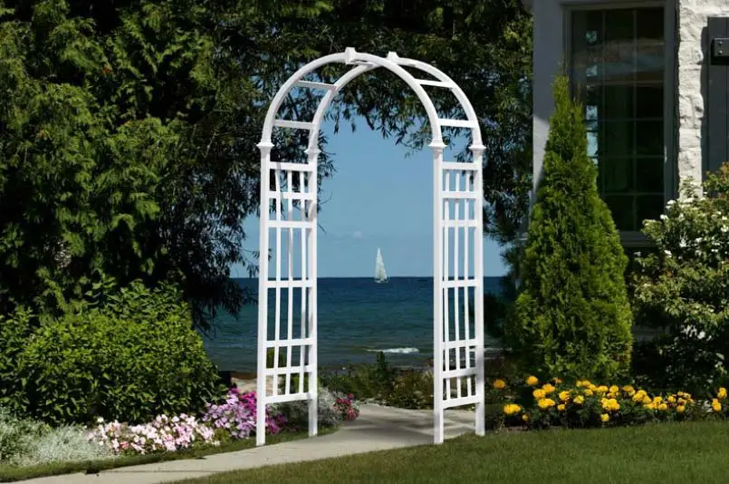 White vinyl arbor with view of the ocean