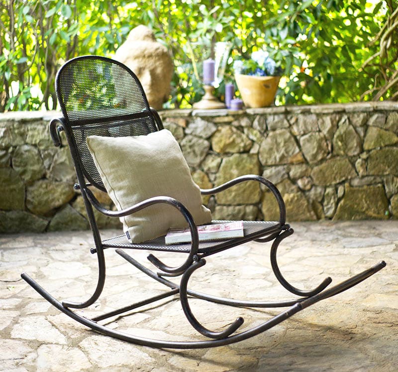 Metal rocking chair on patio