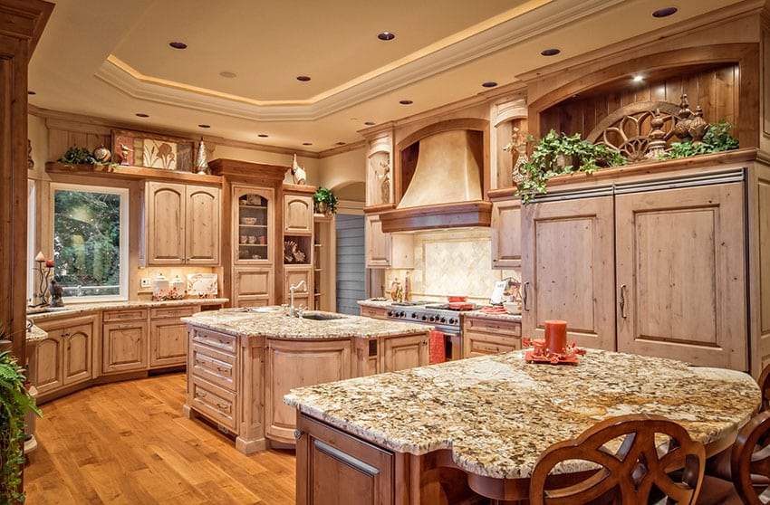 Country kitchen with solid wood cabinets and two islands