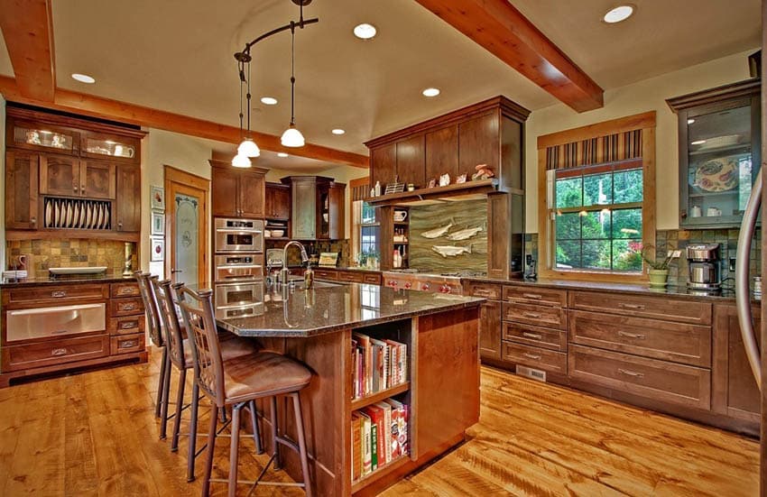 Craftsman kitchen with pine floors and hanging lights