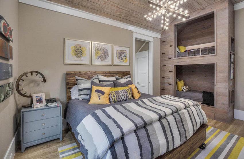 Contemporary beige bedroom with gray and yellow decor and wood floors