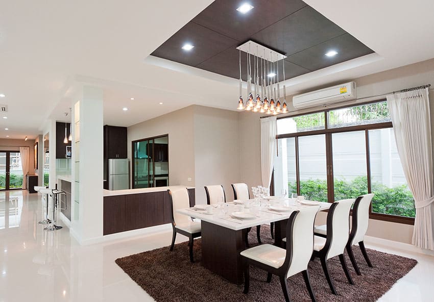 Contemporary dining room with rectangular pendant cluster lighting
