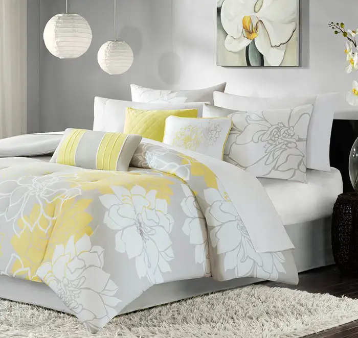 Gray and yellow comforter set with floral print
