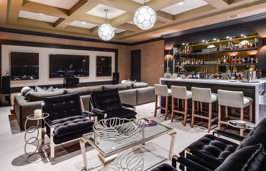 Living room with home bar with marble waterfall countertop and open shelving