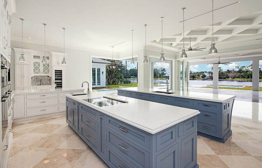 luxury kitchen with contrasting storm gray and white cabinets with two islands