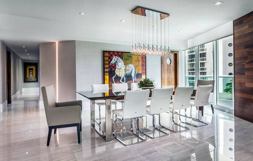 Luxury modern dining room with multiple pendant lighting and recessed lights