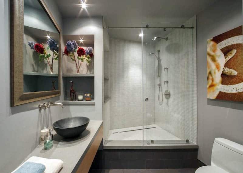 modern-bathroom-with-stainless-steel-infinity-shower-drain-and-tile-enclosure