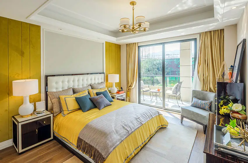 Yellow and gray bedroom design with balcony