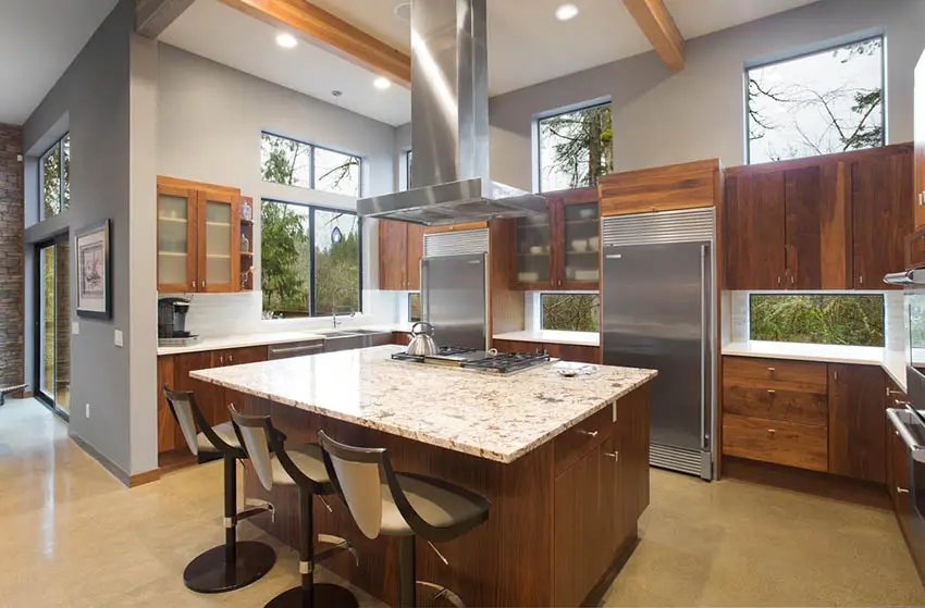 Kitchen with clerestory windows, steel appliances and square island