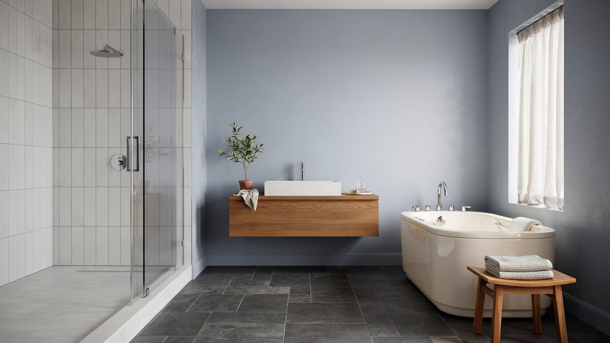 Slate-floored master bath with a porcelain shower and bluebell painted walls