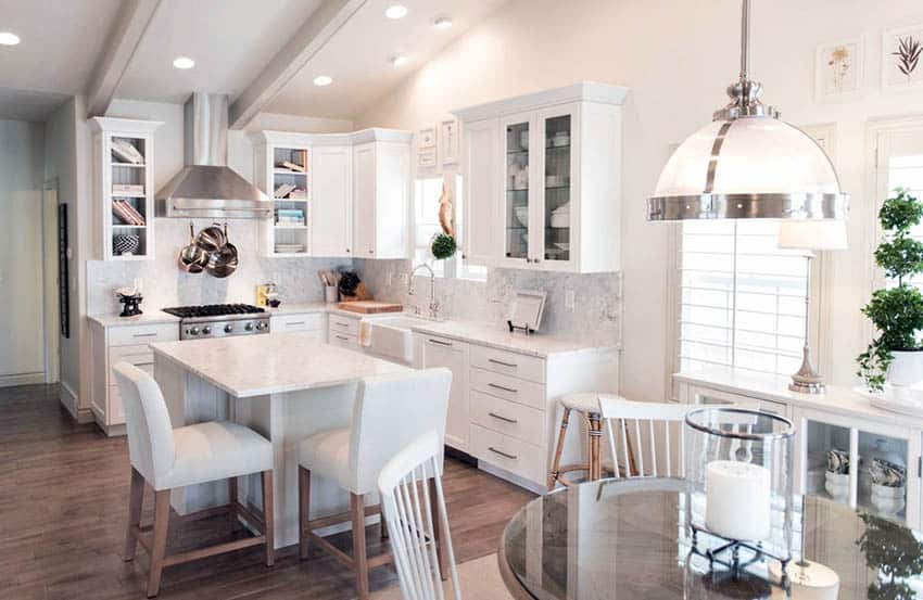 Corner kitchen with blended design bright white paint and white cabinets
