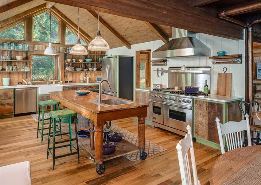Country kitchen with wood cabinets muted green color paint