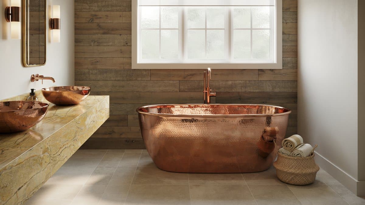 Craftsman bath with a hammered copper tub, copper sinks, and bronze sconces