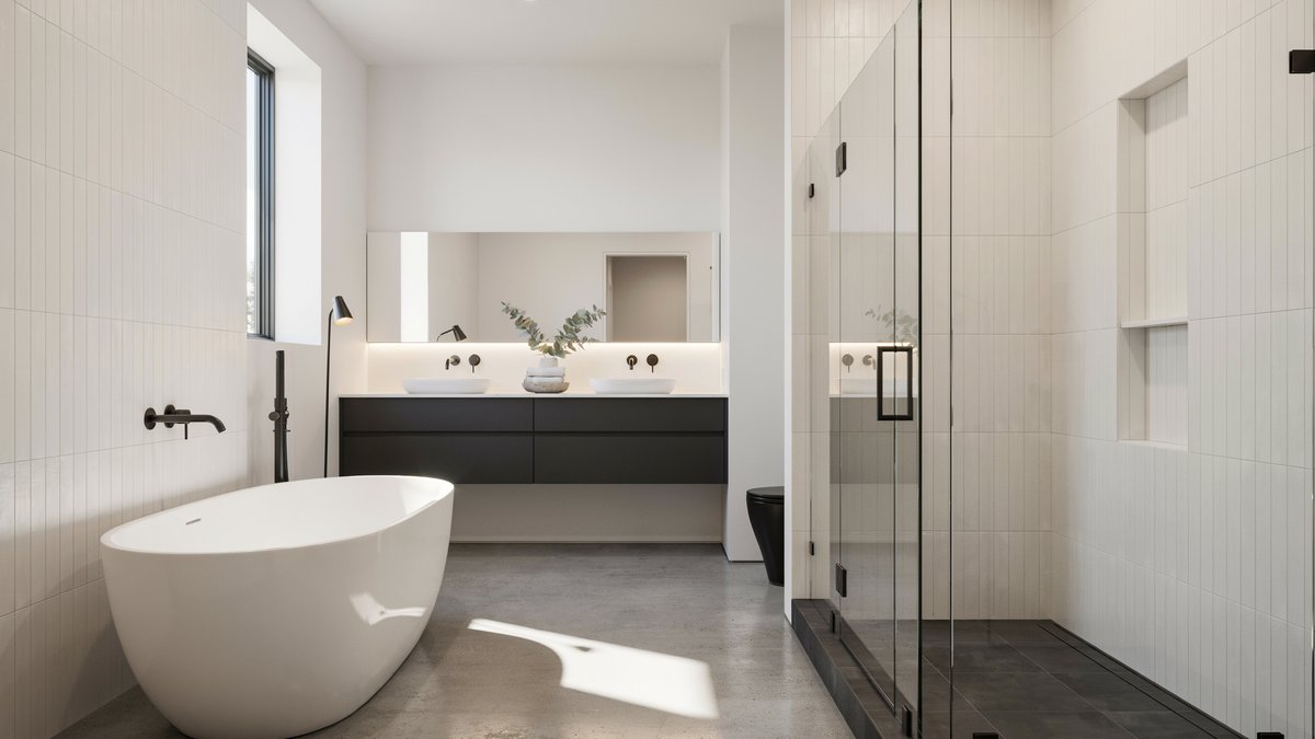 Black and white bathroom with a frameless glass shower and tub combination