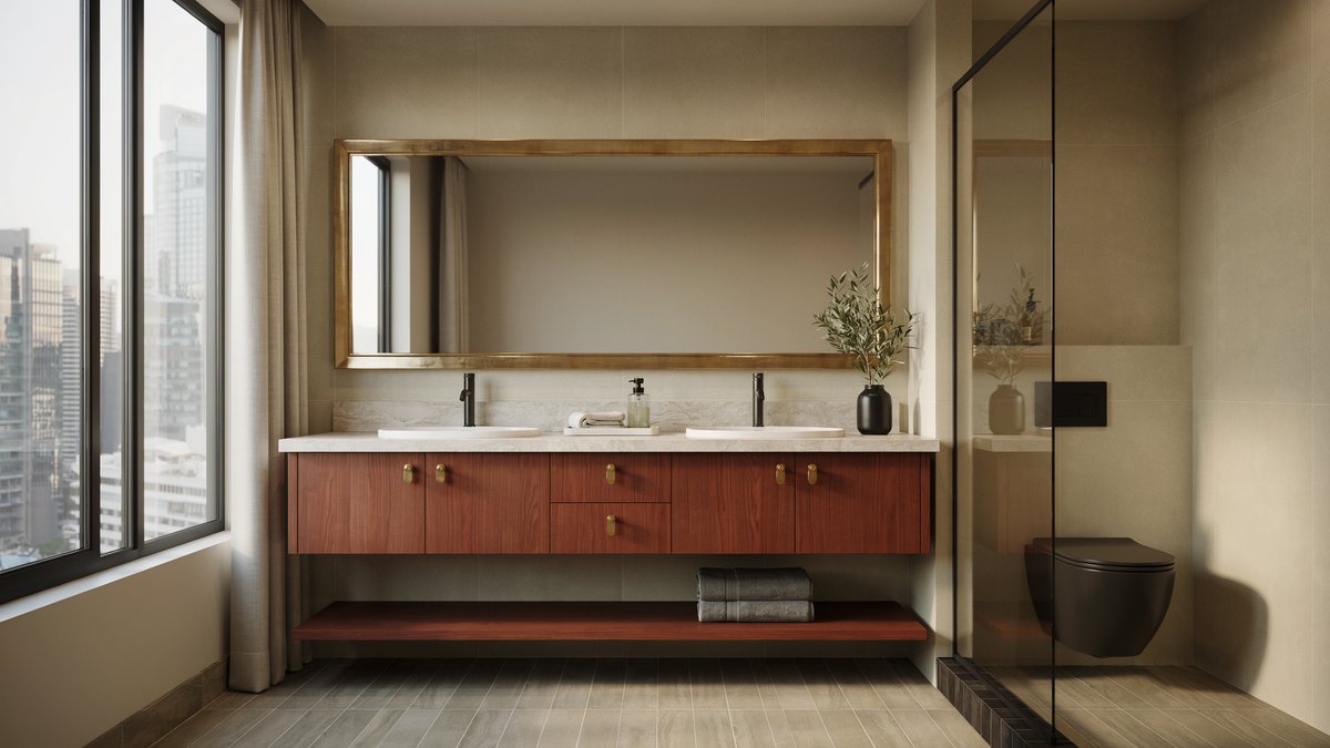 Gold and brown bathroom with cherrywood cabinets and a city skyline window