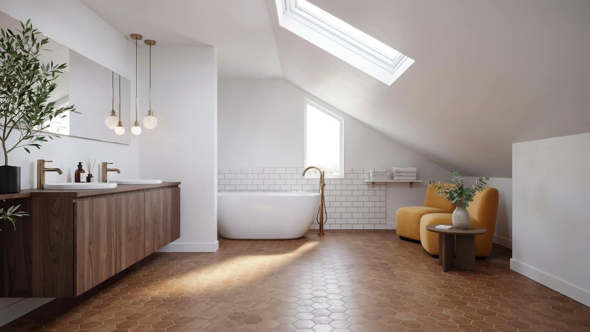 Bright attic bathroom with copper floor tiles, wenge vanity, and yellow chairs