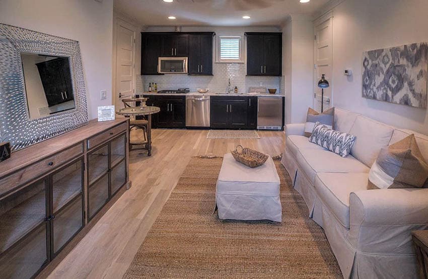 Basement with light maple wood flooring