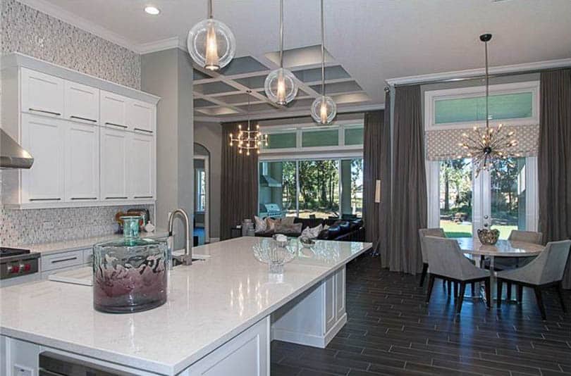 kitchen with dining breakfast nook and glass pendants