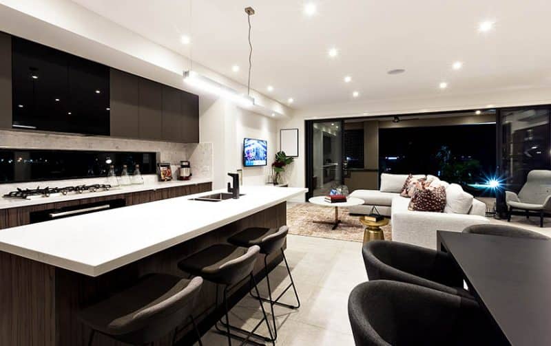 Dark Modern Kitchen With Open Concept Dining Room And Living Room Design 800x503 