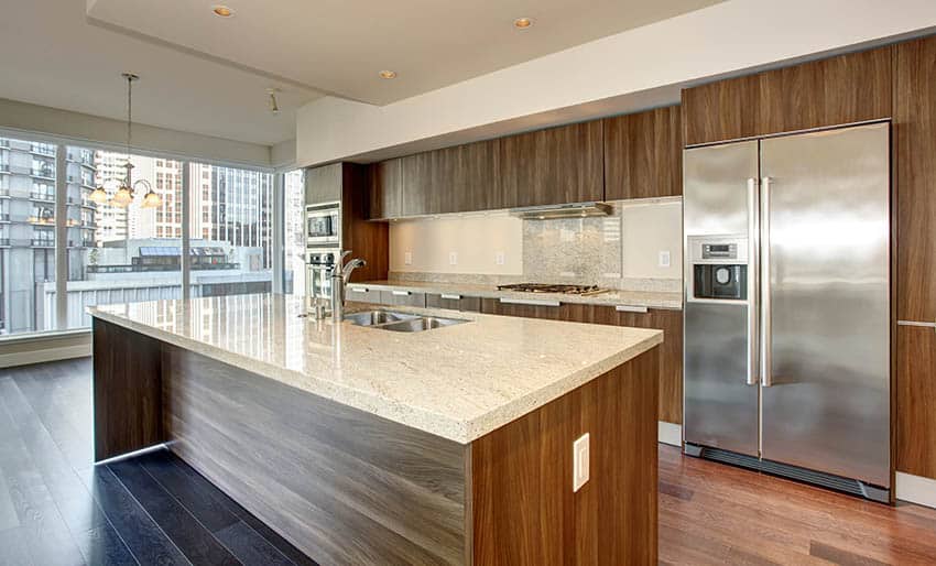 Kitchen with full access cabinets and rectangular island