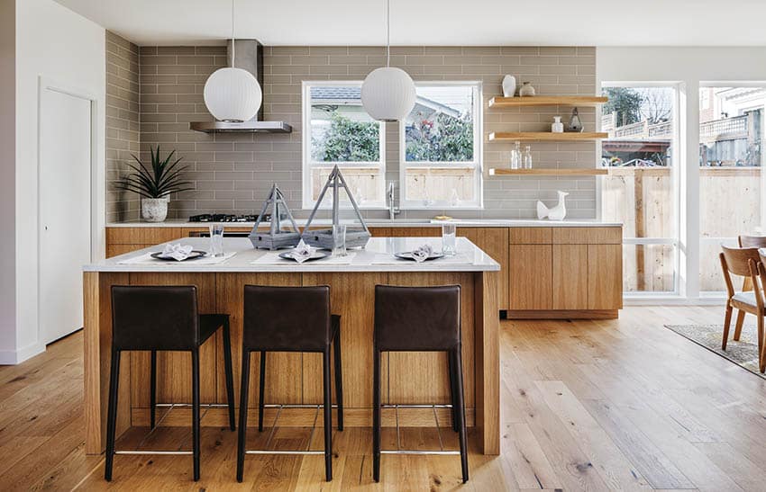 Kitchen with light wood european style cabinets and quartz countertops 