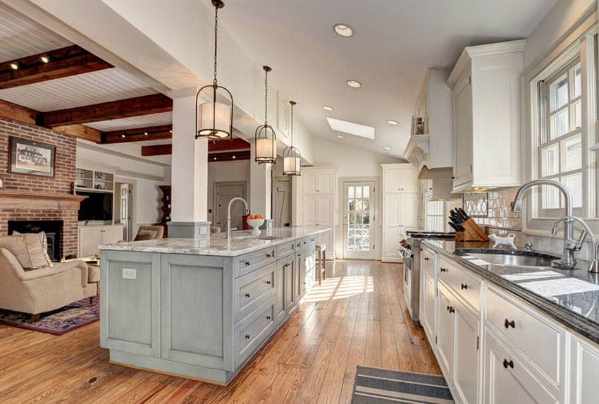 Lovely country kitchen with two color cabinets and drum pendants