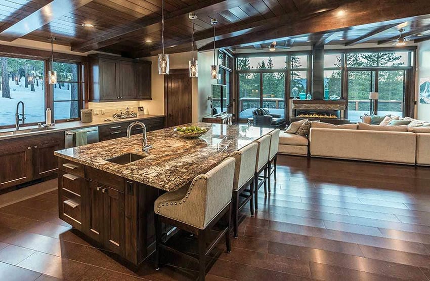 Craftsman kitchen with pendants, brown granite and views