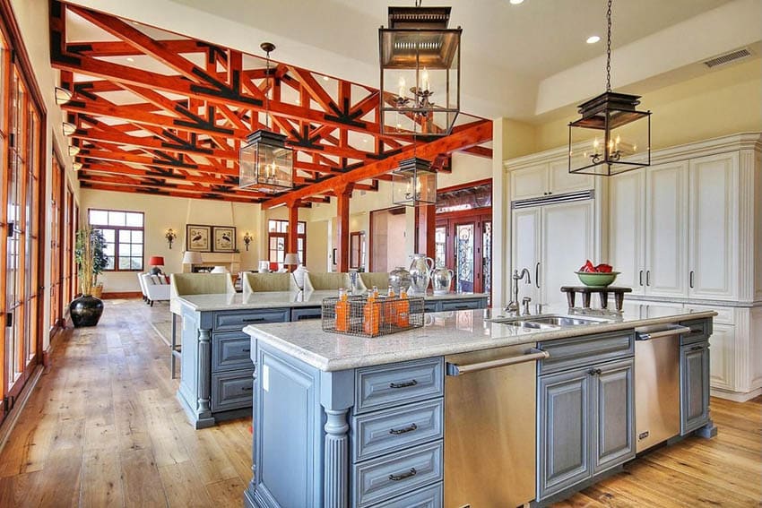 kitchen with blue cabinets, off-white cabinets and two islands