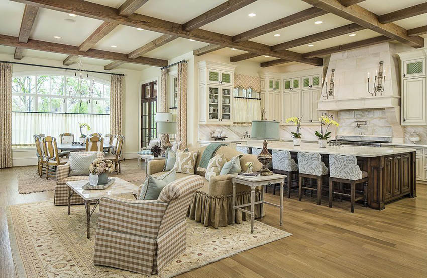 Open kitchen with cream cabinets and engineered oak flooring