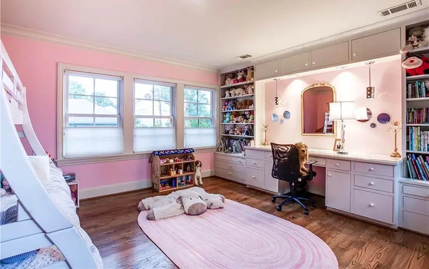 Bedroom with painted furniture pink walls