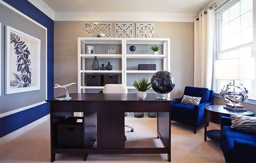 Beige office with royal blue accent wall and furniture