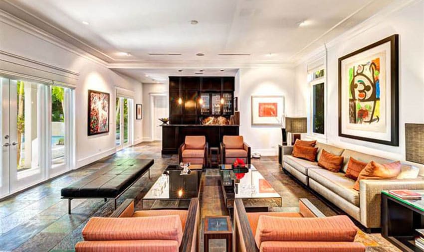 Masculine contemporary living room with home bar and artwork