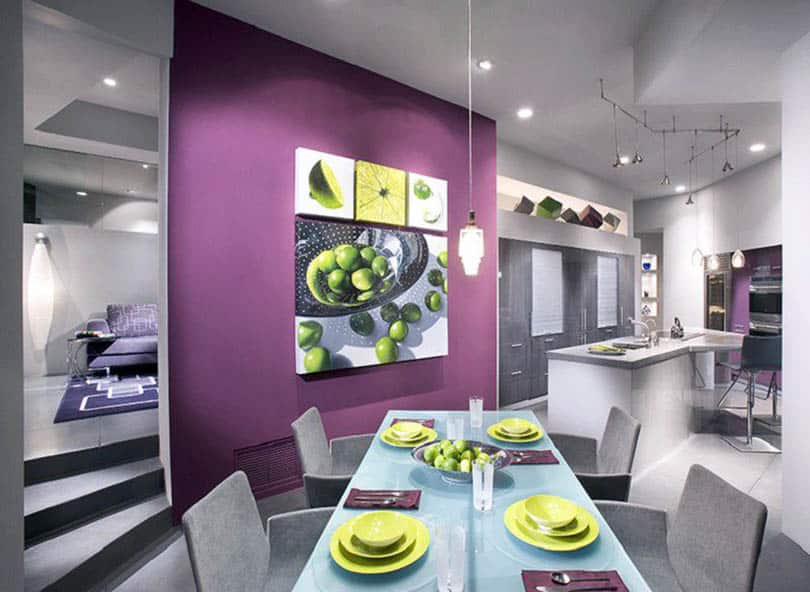 Modern dining room with purple accent wall and gray paint
