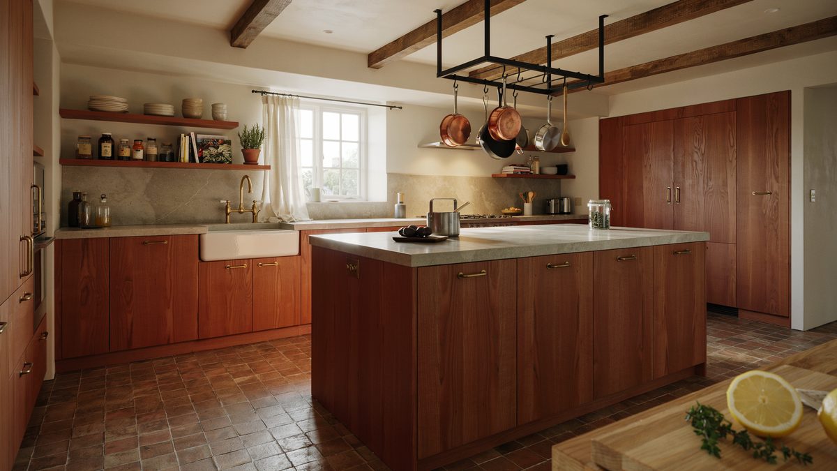 Cherry chefs kitchen with concrete counters hanging copper pot rack and terracotta floor