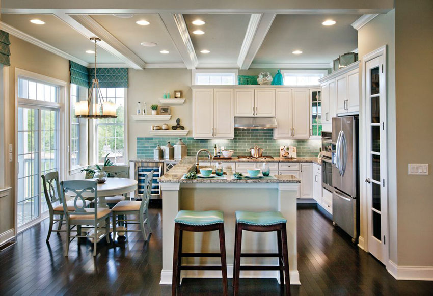 Coastal Kitchen With Decor And Vase Above Cabinets 