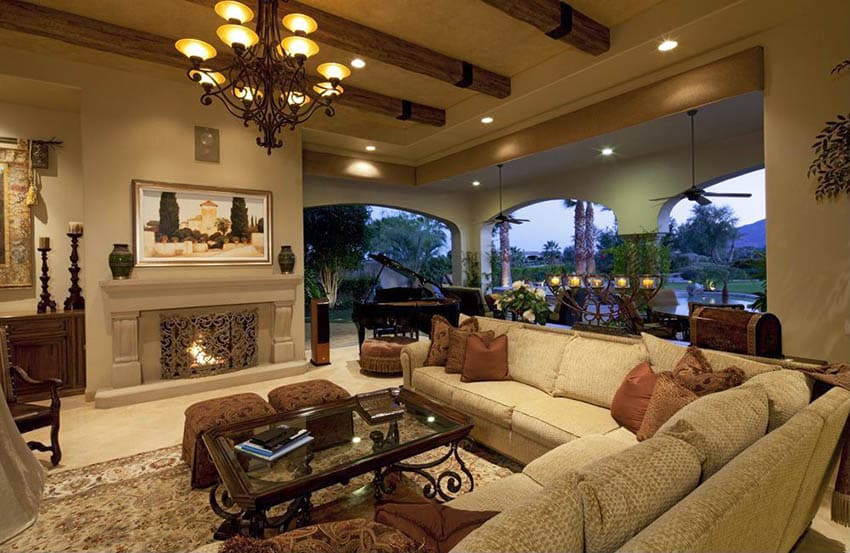 Contemporary room with brown furniture and wood beam ceiling