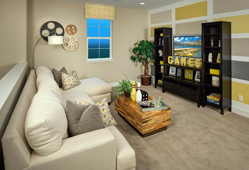 Contemporary living room with painted yellow and gray accent wall