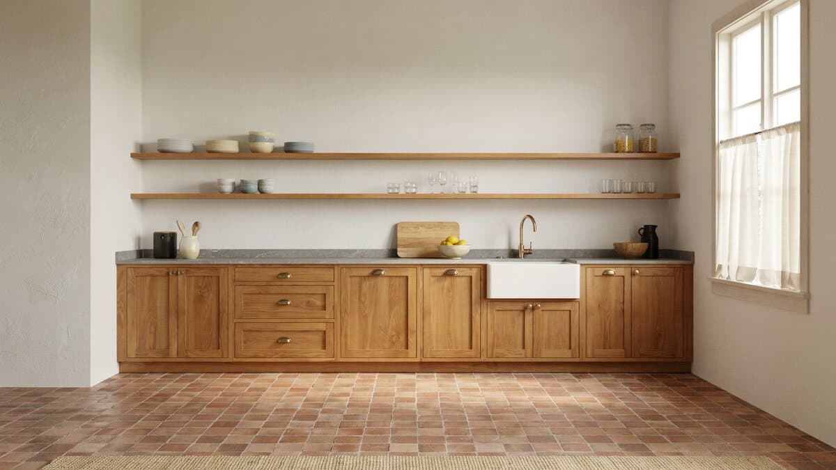 Long oak cabinet run with open shelves above a patterned octagon tile floor