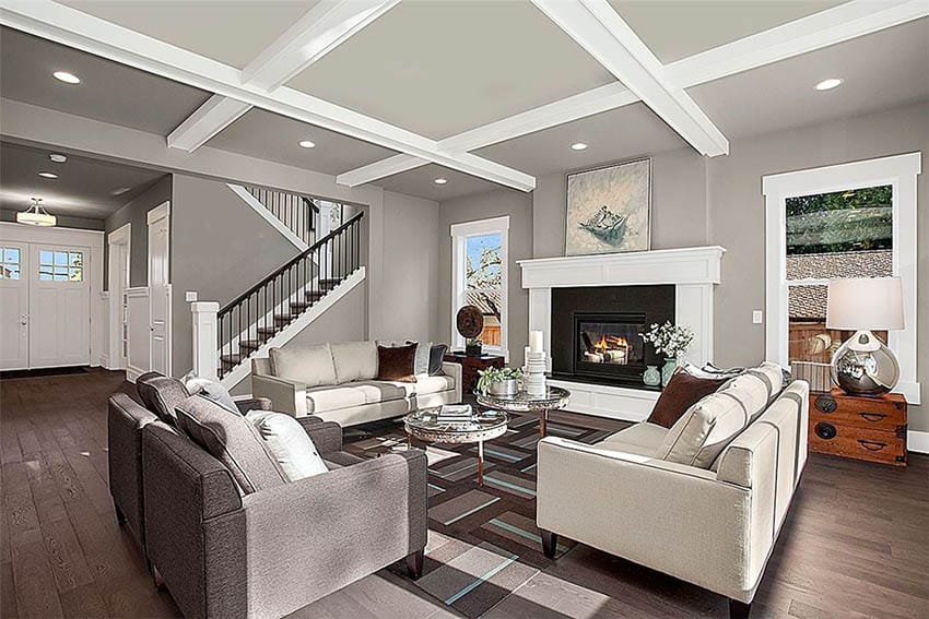 Gray living room with white box ceiling and wood flooring