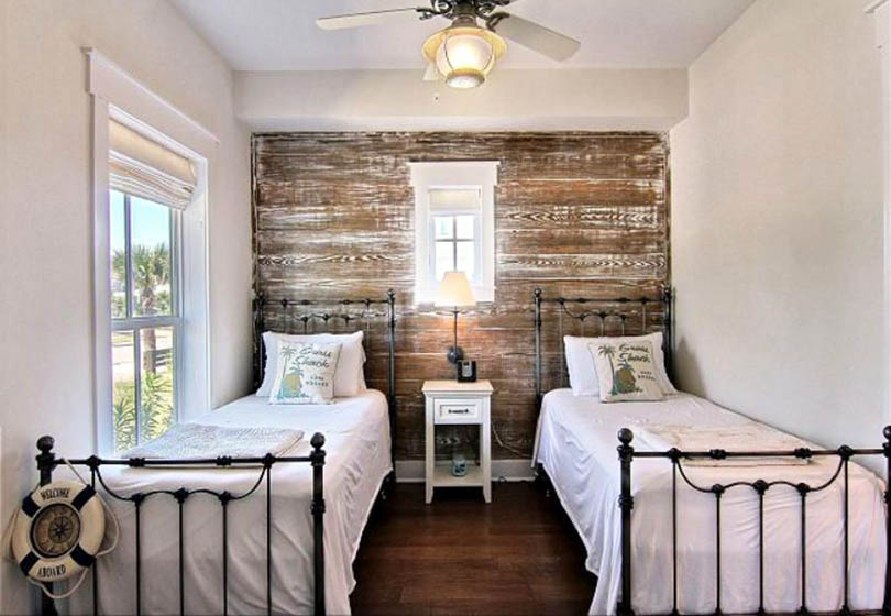 Guest bedroom with off white paint and reclaimed barn wood 