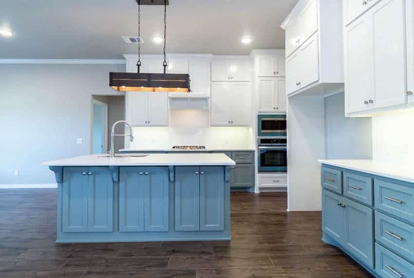 Kitchen with walnut floors, chrome faucet and bar lighting