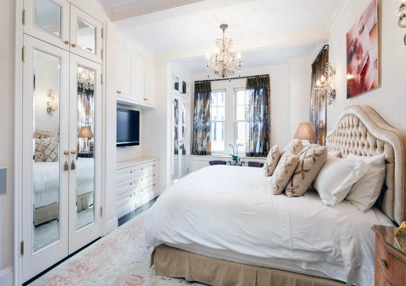 Master bedroom with mirrored doors