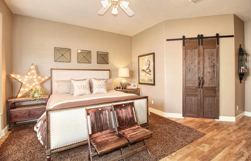 Bedroom with sliding barn door