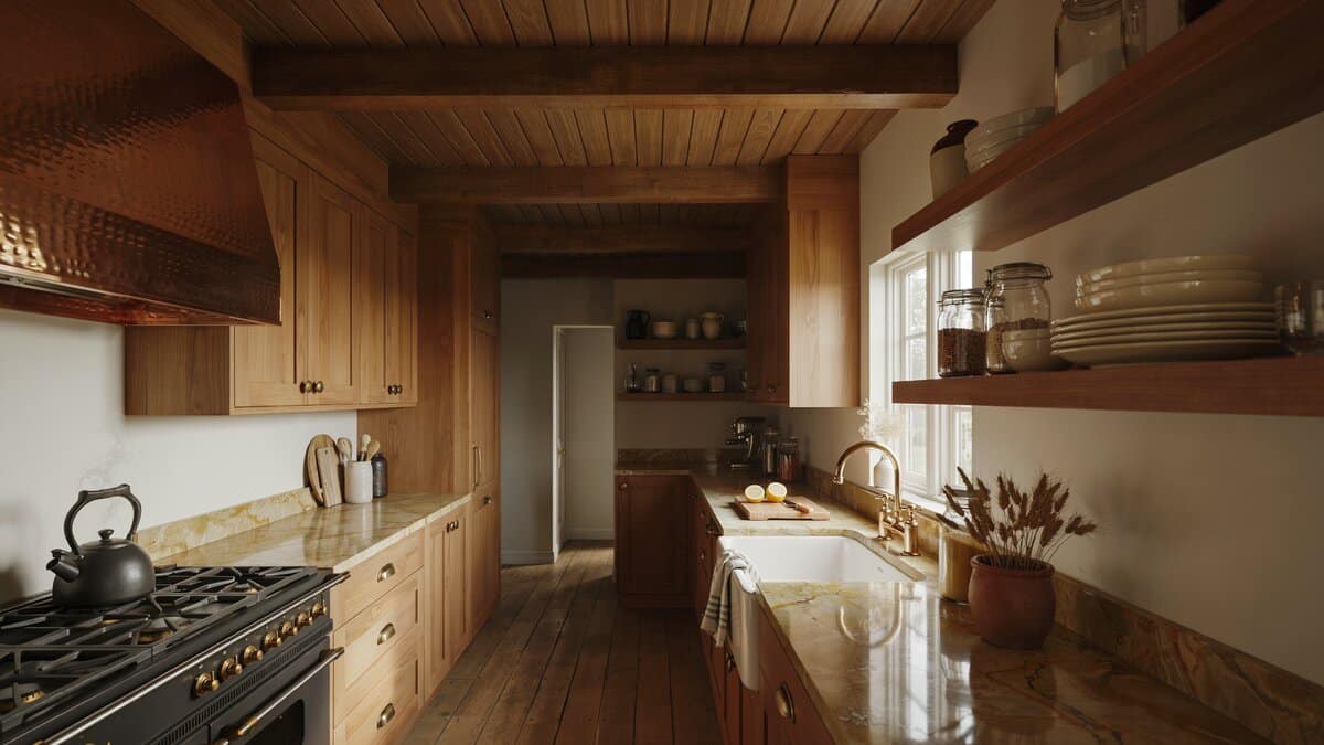 Hammered copper range hood above a black range in a dark walnut galley kitchen