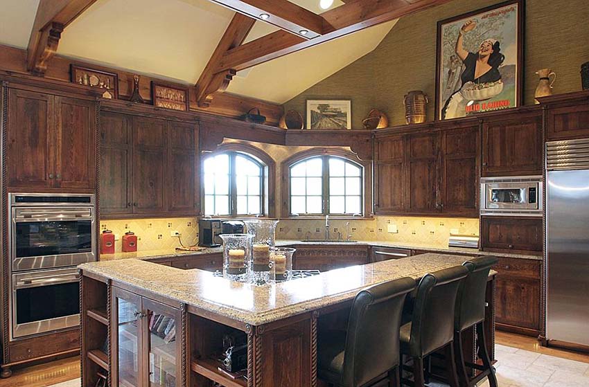 Traditional kitchen with art above cabinets