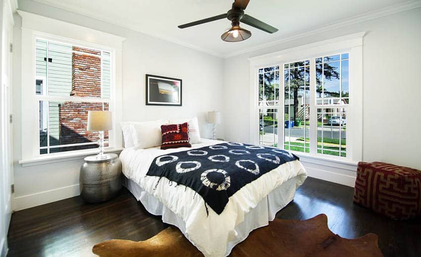 Bedroom with corner ottoman