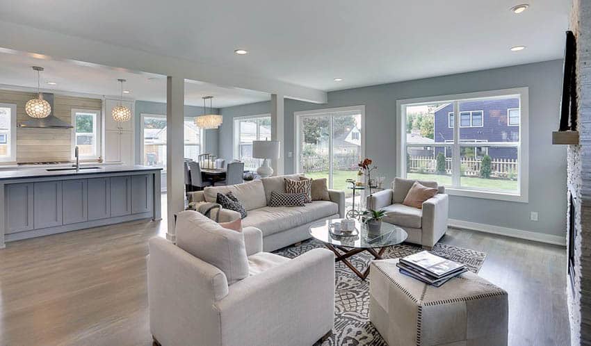 Family room, kitchen, dining room combo with wood floors and fireplace