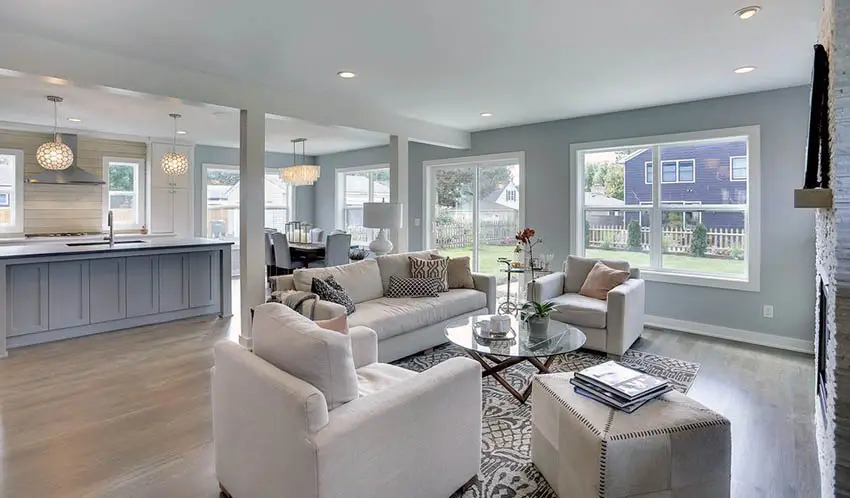 Family room, kitchen, dining room combo with wood floors and fireplace