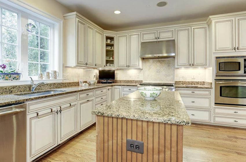 Traditional Kitchen With Beige Granite And Distressed Cream Cabinets 